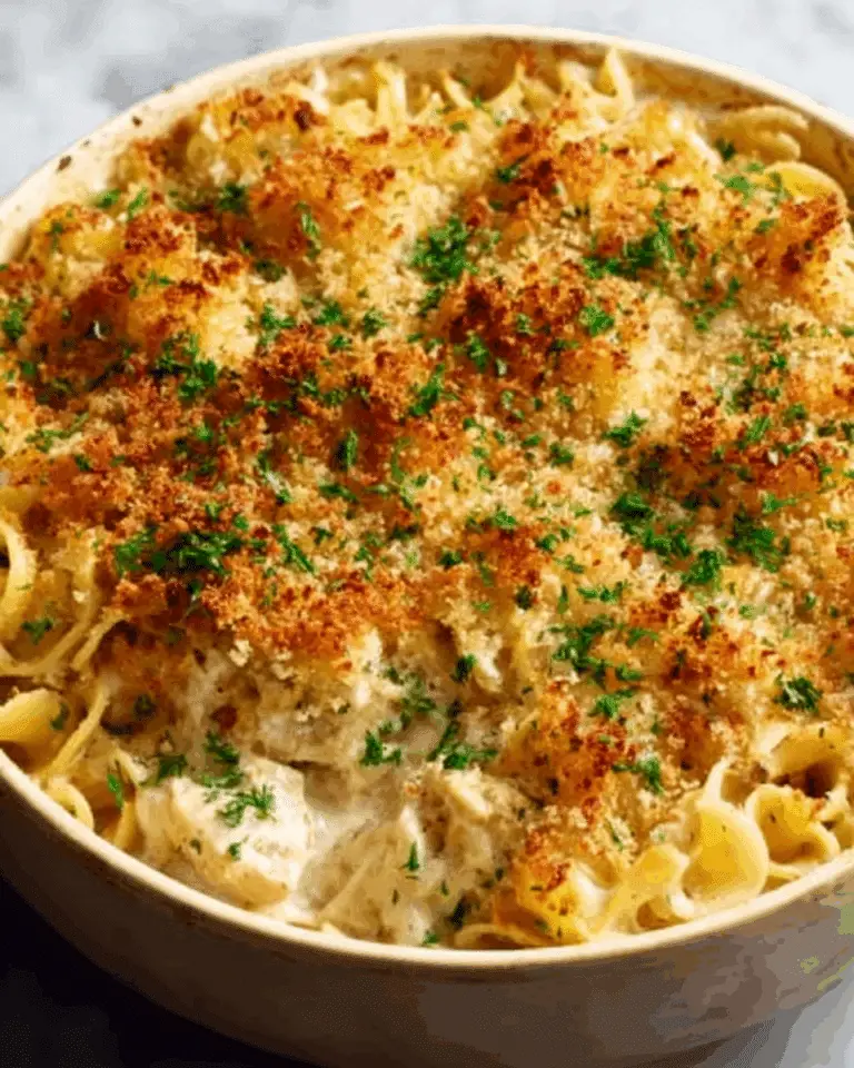 Spread the creamy chicken mixture evenly into the prepared baking dish Recipe
